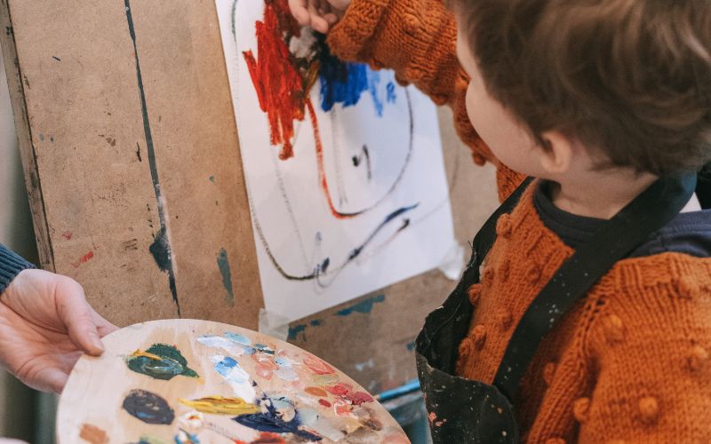 Child painting.