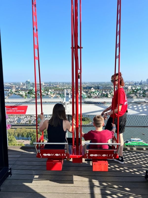 Highest swing in Europe and mum and son getting on. Highest swing in Europe and mum and son getting on.