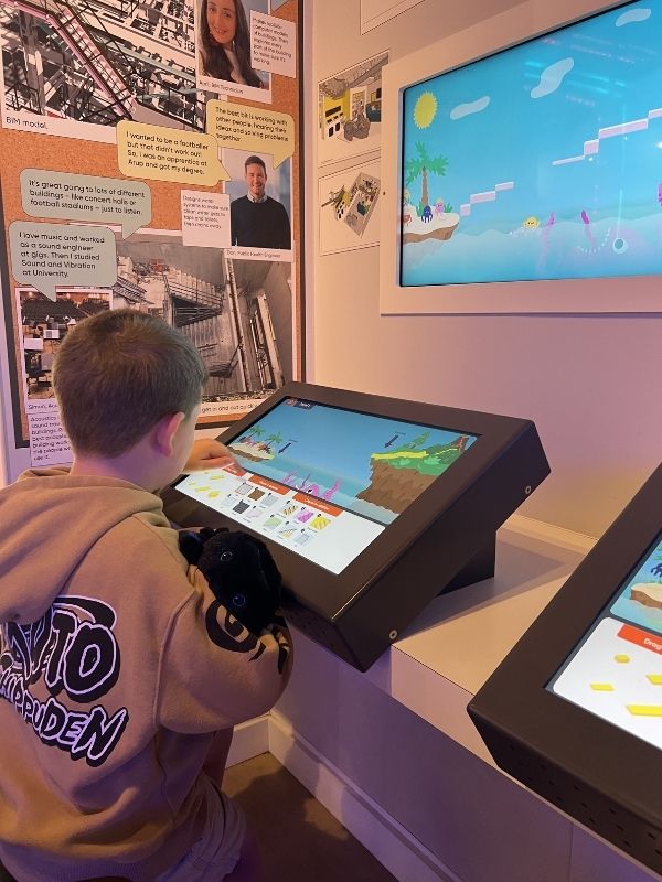 Boy engaging in an activity at Eureka! Science and Discovery in Wirral.