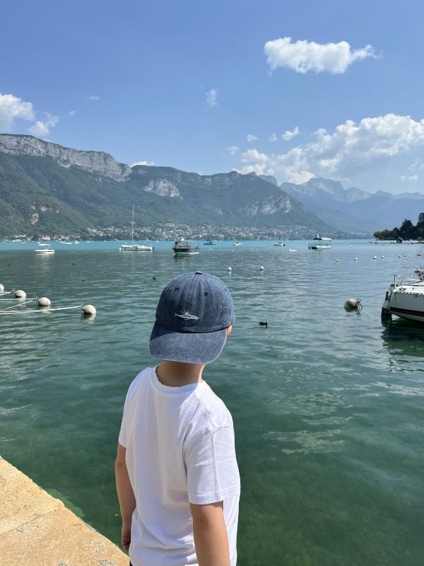 Little boy looking at the mountain views in Annecy.