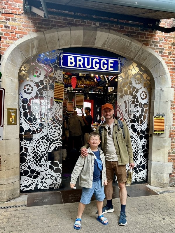 Posing in Bruges during our interrailing with kids trip.